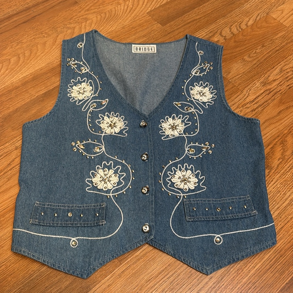 Vintage 1990’s Bridge embroidered denim vest with floral design. Size S/M.